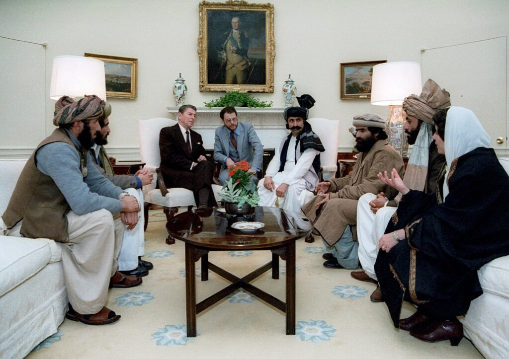 Reagan_sitting_with_people_from_the_Afghanistan-Pakistan_region_in_February_1983